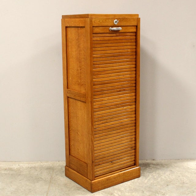 Single-shutter filing cabinet Made of oak Early 1900s Dimensions: width 45 cm, depth 36 cm, height 120 cm Restored (see...