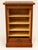 A superb small roll-top filing cabinet in the traditional office style, crafted from solid oak with golden-amber...