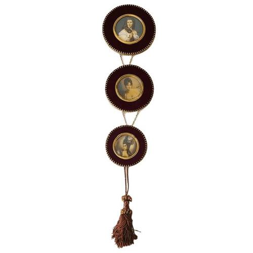 A rare and beautifully preserved antique triptych (vertical chain) featuring three hand-painted wall miniatures. It...