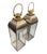 A striking pair of vintage, large-scale floor lanterns, blending classic maritime design with a sophisticated Hollywood...