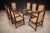 This refined set of eight dining chairs, produced by Celina Decorações in the 1960s, reflects the restrained elegance that...