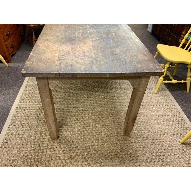 20th century pine farmhouse table. Hand crafted with great patina. Perfect for a small dining. Table, kitchen table or...