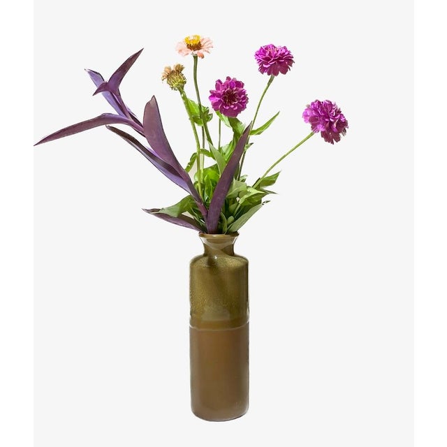 This striking mid-century modern bottle vase was produced by the renowned Scheurich Keramik of West Germany during the...
