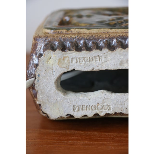 Stoneware lamp base by Swedish ceramist Willi Fischer for Ego Stengods, 1960. In excellent condition despite its age. The...