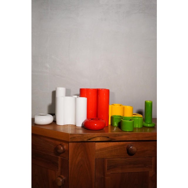 Set of 9 vases by Angelo Spagnolo for Sicar, 1970s, in colored glazed ceramic, in excellent condition. This piece has an...