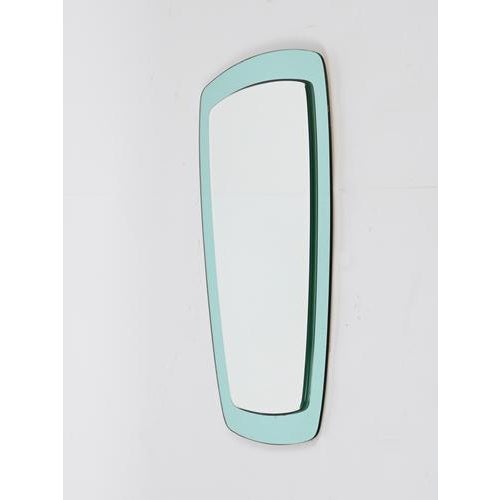 Stunning rectangular mirror with a gorgeous and vibrant turquoise mirrored crystal frame. This enchanting mirror was...