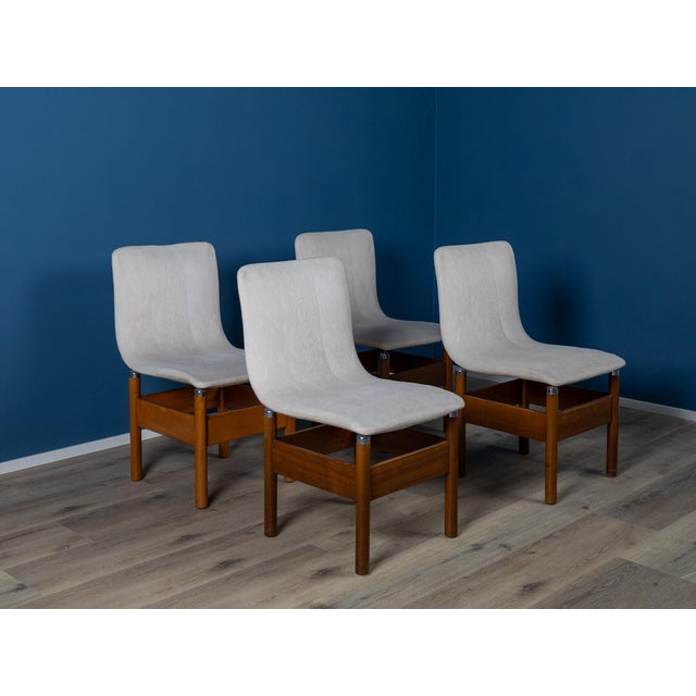 This elegant set of four chairs, designed by Vittorio Introini for Saporiti in the 1960s, is an authentic expression of...