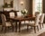 An exceptionally rare Henredon Grand Provenance dining table, featuring fluted tapered legs with claw (paw) feet—a seldom-...