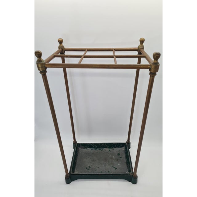 An elegant antique umbrella and walking stick stand in the Victorian style, made in England in the second half of the 19th...