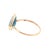 A 21st-century gold ring featuring a triangular mixed-cut aquamarine stone. The band is slender and smooth, showcasing a...