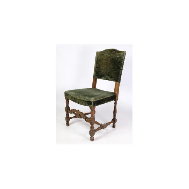 2 oak chairs in renaissance style upholstered with green velor fabric from around the 1930s. Dimensions in cm: h: 95 w: 50...