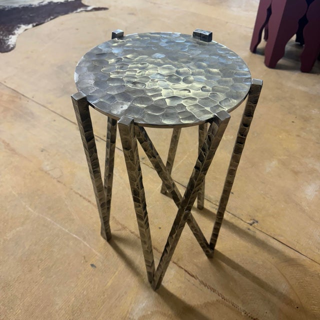 The Huck Drink Table is a sculptural accent piece that brings artistry and function into perfect balance. Handcrafted from...