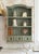 ​Add effortless cottage charm and timeless character to your walls with this solid wood hanging shelf unit. Finished in a...