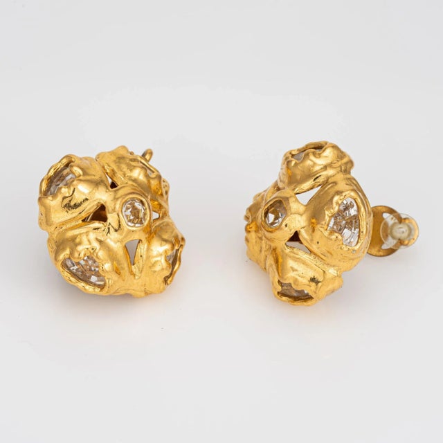 This is part of Chairish’s Costume Jewelry assortment. Pre-owned Chanel CC logo large round earrings (circa the early...