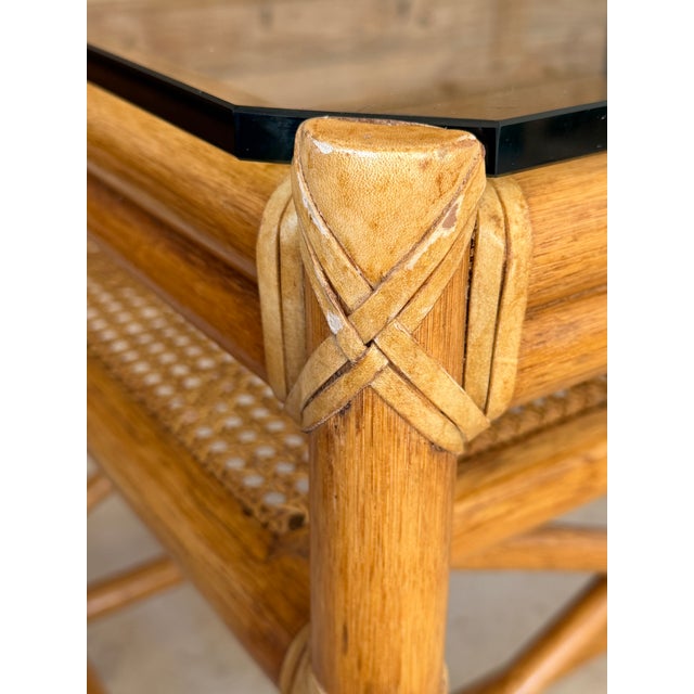 Wood Pair of Vintage McGuire Organic Modern Rattan Side Tables With Cane Shelves and Glass Tops For Sale - Image 7 of 12