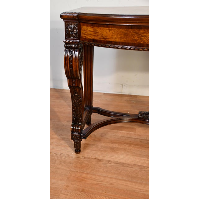 We are pleased to offer this beautiful French Louis XVI console table, from the 1900s. This console is made of Walnut &...