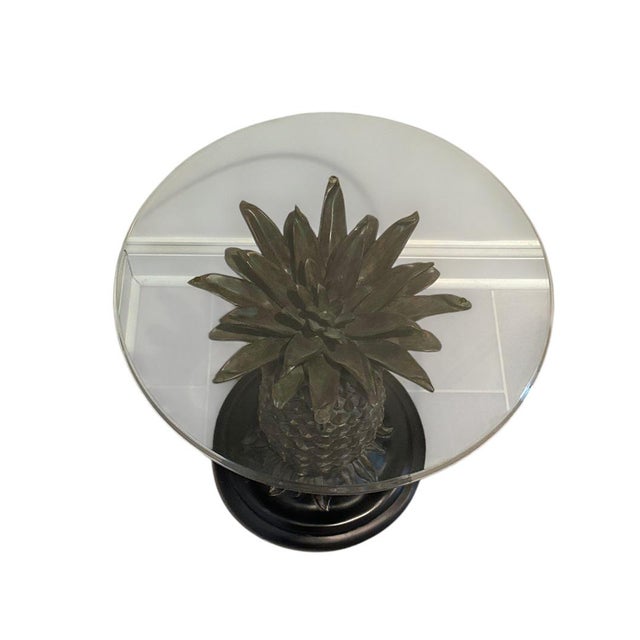 The Joan Collins Pineapple Table with Glass Top is a stylish and elegant coffee table made in the United States. Featuring...