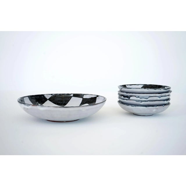 - Set of 5 ceramic plates - Chess-themed in black and white - Made by hand - Individually signed and dated - Diameter of...