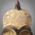 The Fang face mask, displaying wear both on its surface and interior, signifies its age and extensive use.Â It is crafted...