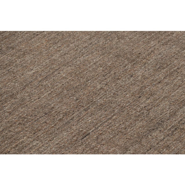 This 15x24 contemporary rug is the newest addition to the Rug & Kilim Textural Collection, with an inventive take on solid...