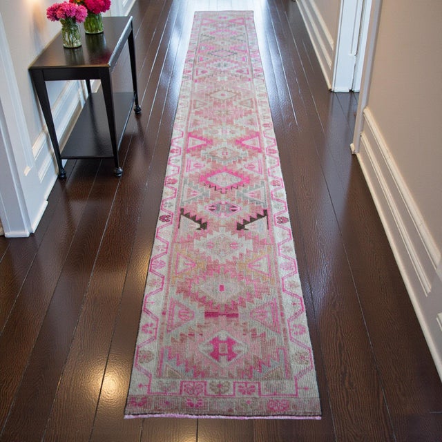 This mid-century Oushak runner, woven in the 1970s, captures the artistic heritage of the Aegean Anatolian highlands....