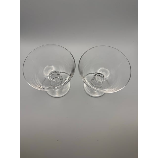 Vintage set of two crystal coupe glasses featuring a classic ball (knop) stem, also known as a baluster stem. These...