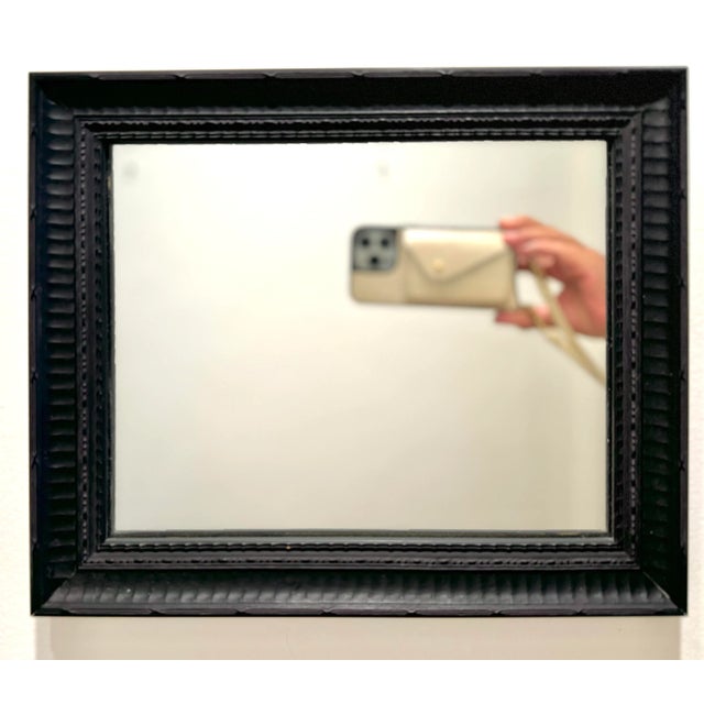 Beautiful vintage ebony wood framed mirror/ lightly antiqued . 12.5 inches by 10.5” inches by 1.5” deep. Can hang vertical...
