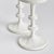 In a playful nod to the old way of counting, the notches along the body of these candle stands add a modern touch. This...
