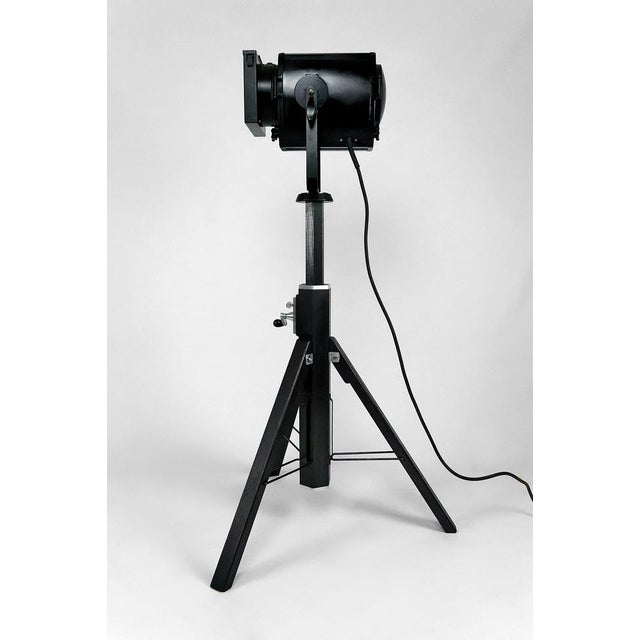 Superb cinema projector and tripod. Spotlight with wooden transport box. Height adjustable foot. In very good condition,...