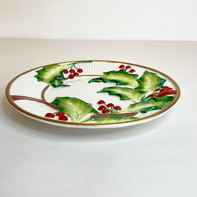 Classic Fitz and Floyd holiday decor in a pretty Canapé plate perfect to serve appetizers or petite desserts. The plate...