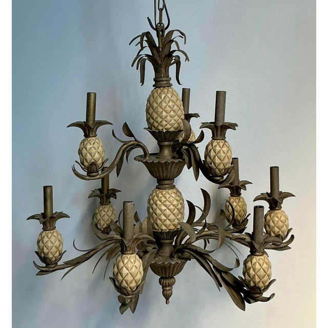 This exquisite vintage chandelier is a masterful distillation of Hollywood Regency glamour and tropical whimsy....