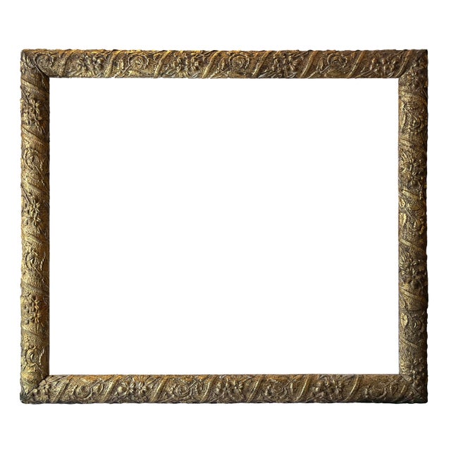 This beautiful Victorian frame has a delicate, carved motif with gilding. It measures 22.75 x 18.75" on the outside, with...