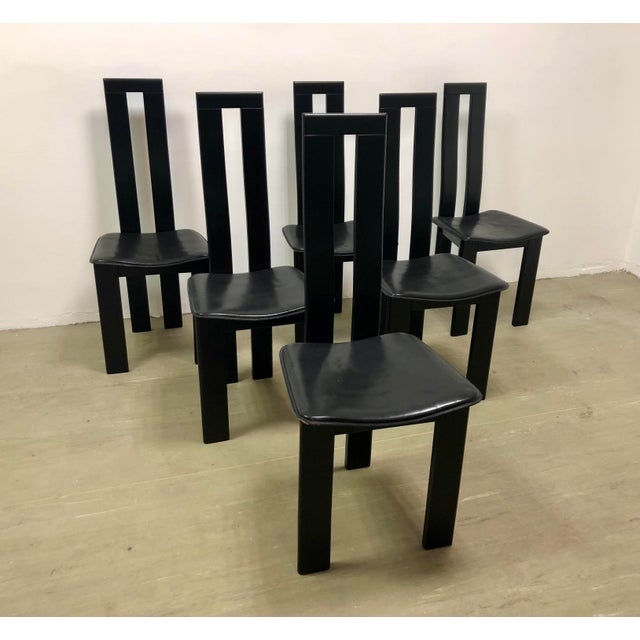Rare complete set. This set of six vintage Italian postmodern dining chairs, designed by Pietro Costantini for Ello in the...