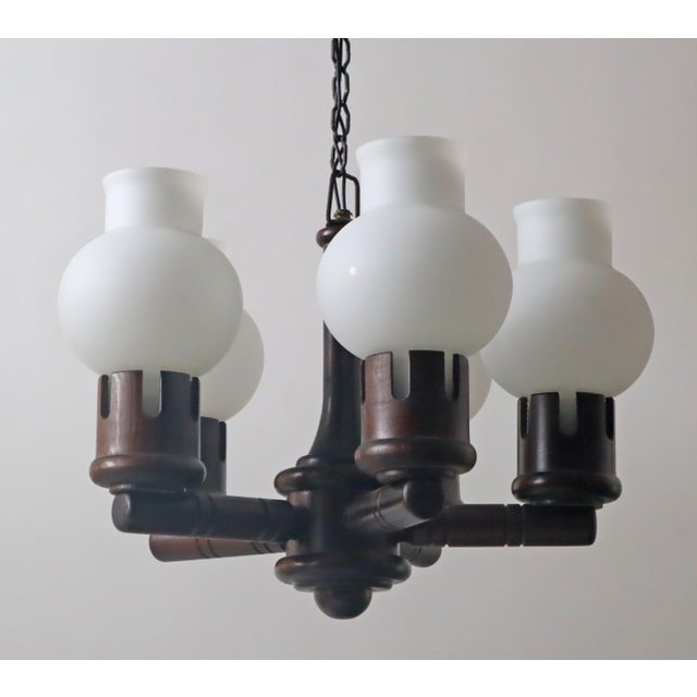 Chandelier in Wood with White Glasses in the Shape of an Onion from Vikrka, Denmark, 1960s, in Very Good conditions....