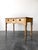 A charming antique 19th century English pine table with a scalloped apron and turned legs. Three drawers with black knobs....