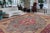 Enhance your living space with this stunning vintage Persian hand-knotted wool rug, a true showstopper that effortlessly...