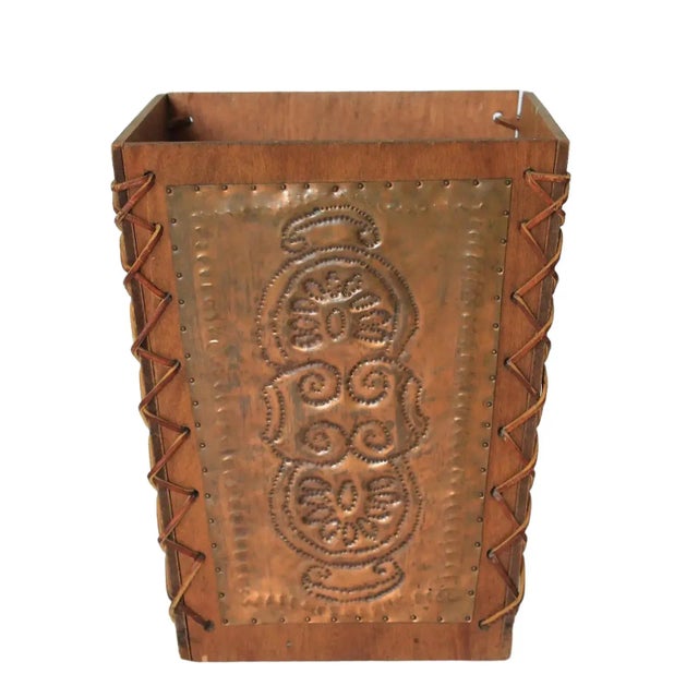 Vintage Arts & Craft style wastebasket with hammered copper panels on each side. Also features leather wrapping on each...