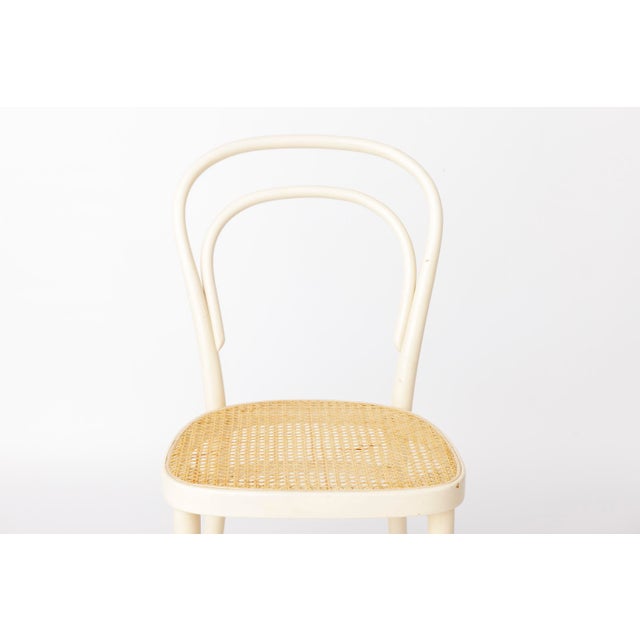 Vintage Bentwood Chair in the Style of Thonet Model 214, approx. 1960s. A classic bentwood chair in the style of the...
