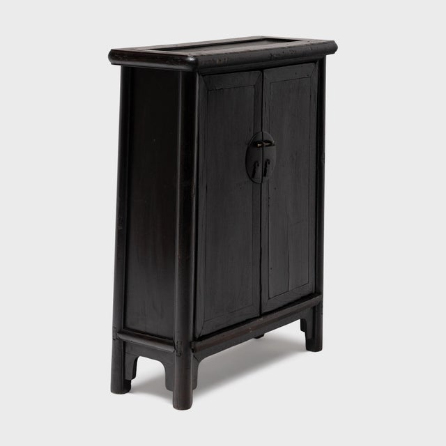 This vintage lacquered storage chest was crafted in the mid-19th century to a streamlined shape that follows traditional...