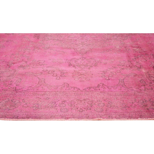 Hand-knotted with care using traditional rug-making techniques, this wool rug blends timeless craftsmanship with a modern...