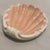 Add a touch of classic Palm Beach style to your space with this vintage Fitz and Floyd Coquille ceramic pink shell dish....