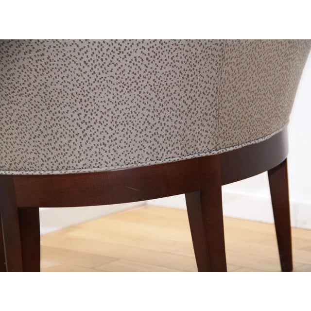 Pair of vintage armchairs by Haworth. Dark varnished wood structure and patterned fabric seat. Original design. In used...