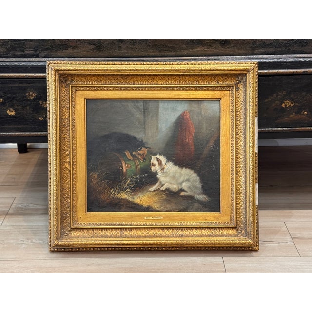 Oil on canvas depicting two terriers — one tan, one white — investigating a barrel amid barn straw, with a red cloth...