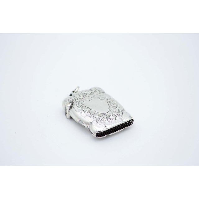 Rectangular Silver Matchbox with Engravings, in Very Good conditions. Designed 1890 to 1919 This piece has an attribution...