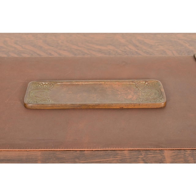A gorgeous antique bronze pen tray or desk tray featuring Zodiac designs By Tiffany Studios (signed to the underside) New...