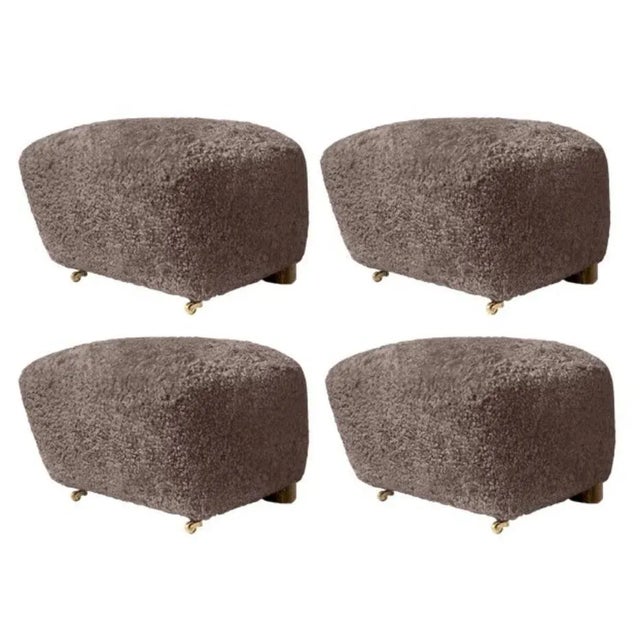 Set of 4 sahara smoked oak sheepskin the tired man footstools by Lassen. Dimensions: W 55 x D 53 x H 36 cm Materials:...
