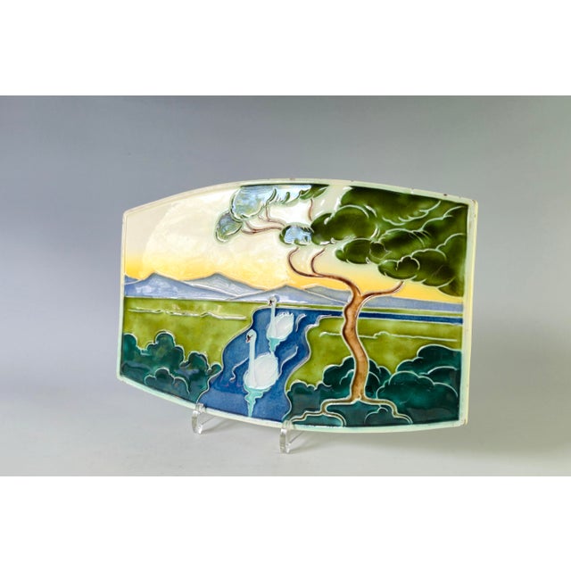 A beautiful, naturalistic, large, oval, geometric Art Nouveau tile from the period 1896-1906. A three-dimensional, relief-...