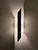 An exceptional collection of 18 matching architectural wall sconces by Donovan Lighting, Ltd., made in the USA and dated...