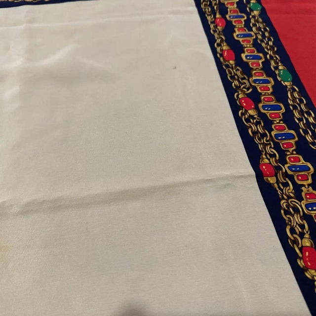 Discover a timeless piece of fashion history with this exquisite 1980s silk carré scarf by the iconic French fashion...