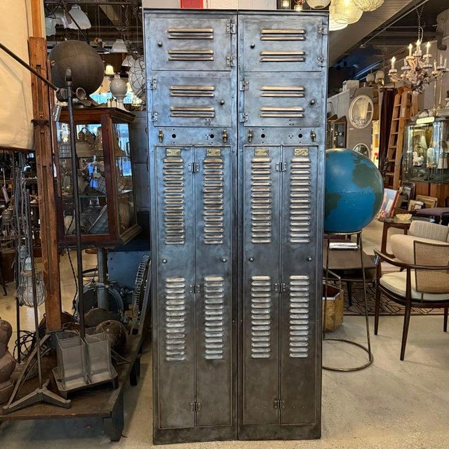 These early 20th century, industrial, brushed factory steel lockers by Hart & Hutchinson Co., New Britain, Conn are called...